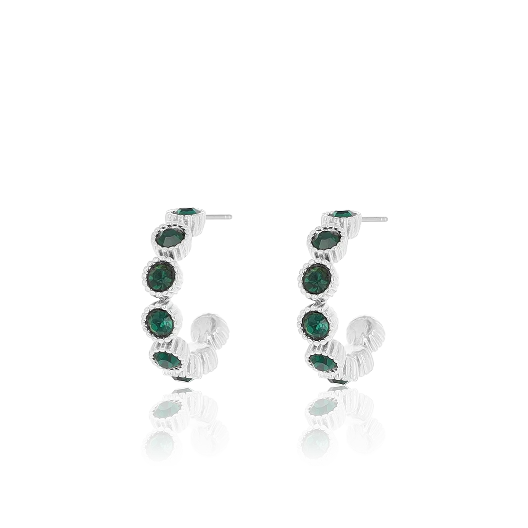 Silver coloured earrings with green stones